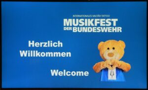 Bundeswehrmusikfest 2023: Maskottchen Paul heißt alle Gäste willkommen.